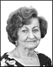 özv. László Béláné